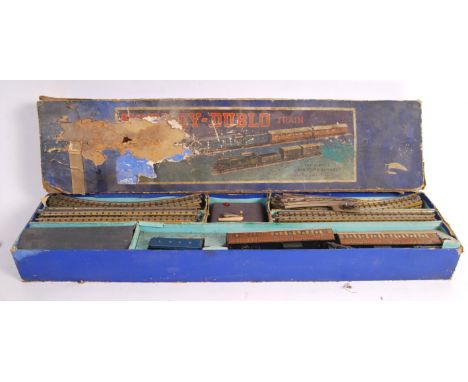A rare original Meccano Hornby Dublo made Pre War Sir Nigel Gresley passenger 00 gauge model railway train set. In the origin