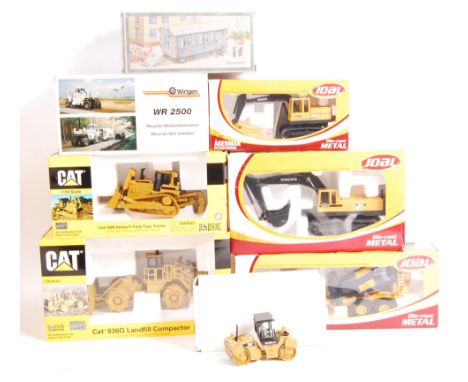 A collection of 8x 1/50 scale construction related diecast models comprising Norscot Cat Caterpillar 55074 CAT 836G Landfill 