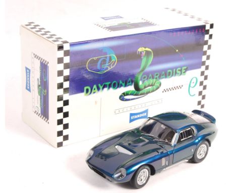 A rare Exoto made 1/18 scale precision diecast model Standox Daytona Paradise Shelby Cobra. In original box with outer white 