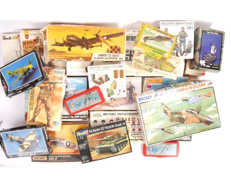 A large collection of assorted scale model kits to include Tamiya, ESCI, Helmet, Revell, Sratfix, Italeri, Ventura, Matchbox,