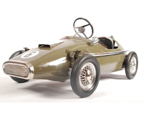 An incredible original vintage 1960's Tri-ang / Triang made child's pedal racing car. Metal body, in brown with No.6 livery. 