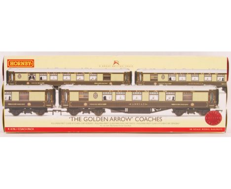A Hornby made 00 gauge model railway boxed coach set R4196 ' The Golden Arrow Coaches '. Comprising of; Zenobia, Adrian and O