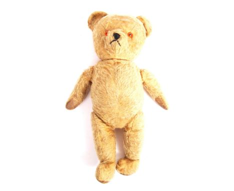 A believed 1940's Chad Valley golden mohair soft toy teddy bear with orange plastic bead eyes, vertical stitched nose, padded