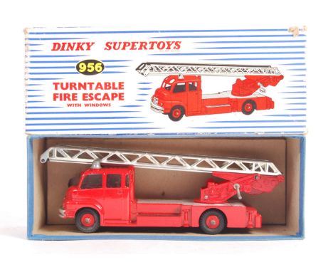 An original vintage Dinky Supertoys made boxed diecast model No. 959 ' Turntable Fire Escape ' Fire Engine. Model appears ver