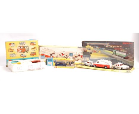 A collection of x3 original vintage Dinky Toys and Corgi Toys made diecast model gift sets to include; Dinky No. 297 Police V