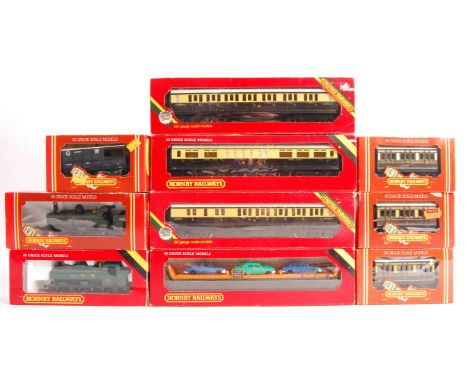 A collection of boxed Hornby 00 Gauge model railway train set locomotives and rolling stock to include; R.059 GWR Class 2721 