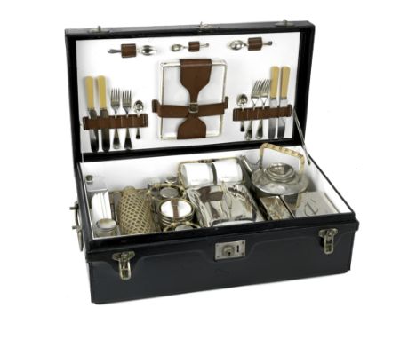 A cased 'Coracle' picnic set for four persons by G.W.Scott &amp; Sons, circa 1909,the black leather-cloth case with nickelled