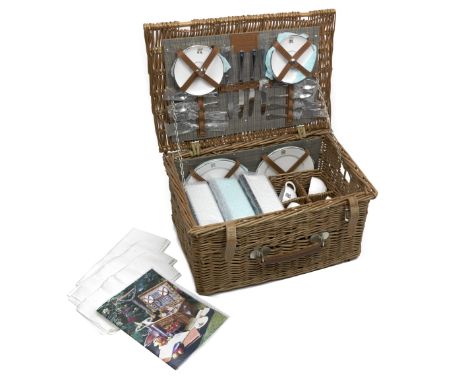 A Rolls-Royce four person wicker picnic hamper by Gadsby, late 1990s,new/old stock, unused, wicker basket with leather handle