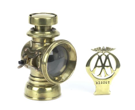 A Lucas 'King's Own' No.F144 oil-illuminating side-lamp and a brass 'AA' member's badge,the polished brass lamp with 3inch (8