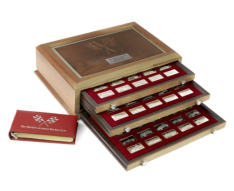 A wooden cased 'First Edition Proof Set' of seventy-five 'The World's Greatest Racing Cars' sterling silver ingots, by Frankl