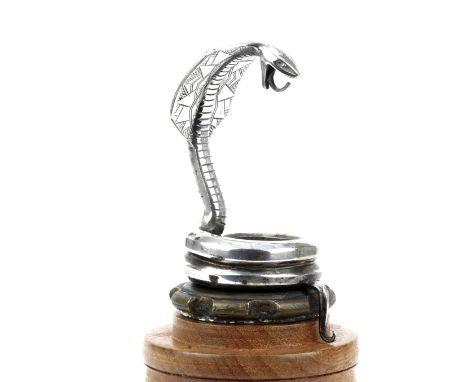 A 'King Cobra' mascot by Henri Rischmann, French circa 1920,signed and marked 'Made in France' to rear of coiled base, nickel