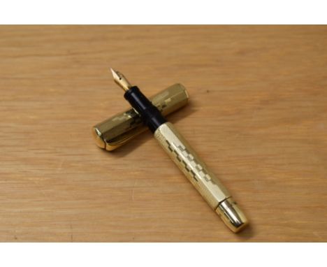 A Record Cavaliere (Milan) button fill fountain pen in Rolled gold of octagonal form having a Record 14ct nib