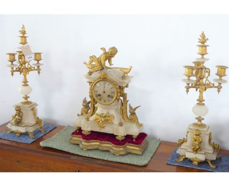 A 19th century marble and gilt-metal-mounted clock&nbsp;garniture; the eight-day clock with Roman numerals and gilded movemen