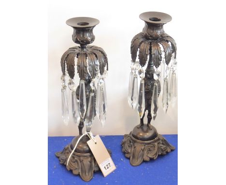 A good pair of probably early 20th century&nbsp;figural bronze candlesticks; each with hand-cut clear-glass lustres (27cm hig
