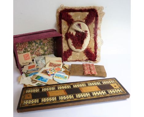 A small selection of stamps including some in an early 20th century leather wallet and six joined penny-reds, an early 20th c