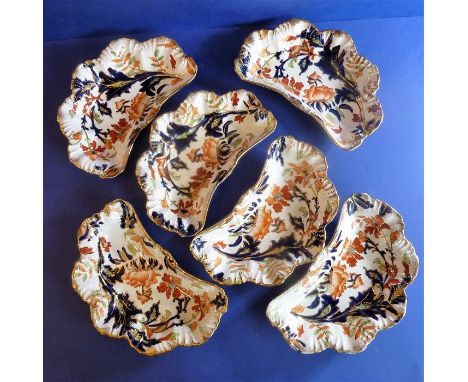 A set of six Ridgways ceramic hors d'oeuvre dishes; hand-gilded and decorated in the 'Fantasia' pattern (22.5cm wide)