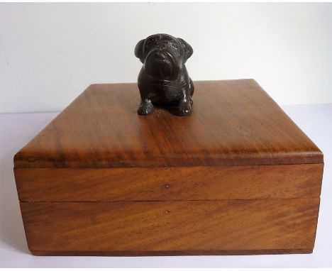 A modern square hardwood box; the lid with a metal handle modelled as a bulldog (probably bronze) (15.5cm square)
