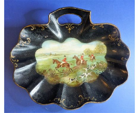 A 19th century scallop-shell-shaped&nbsp;pȃpier-maché&nbsp;crumb-tray hand-decorated in oils with a fox-hunting scene; togeth