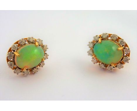 A pair of opal and diamond cluster earrings&nbsp;(The cost of&nbsp;UK postage&nbsp;via Royal Mail Special Delivery for this l