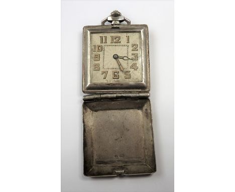 An Art Deco period silver-cased (marked 925) travelling watch; textured dial with Arabic numerals, the engine turned&nbsp;cas