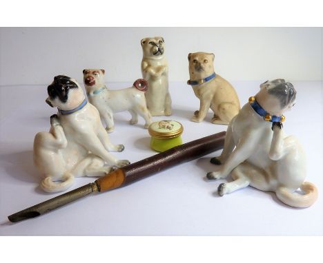 A small selection of mostly late 19th / early 20th century ceramic pugs to include an opposing pair of Meissen porcelain exam