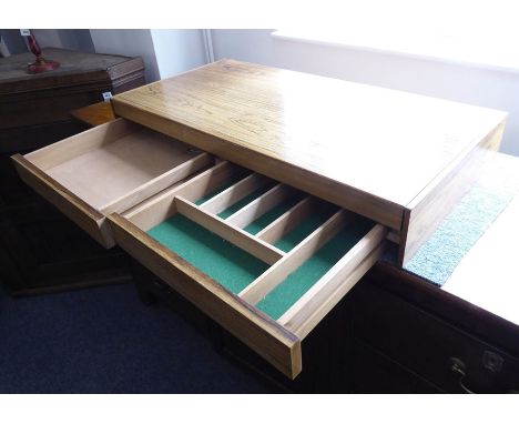 An unusual 1960s/1970s Scandinavian-style horizontally wall-mounted two-drawer rosewood shelf unit, the flush drawers in the 