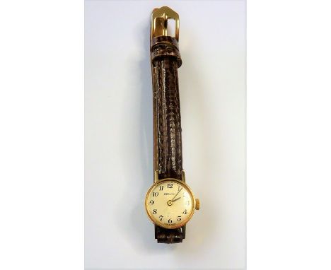 A ladies 9-carat yellow-gold dress wristwatch; the light-bronze-coloured dial signed Zenith and with Arabic numerals, the cas