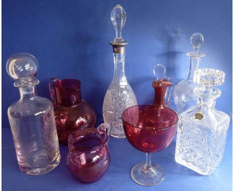 A varied selection of cranberry and clear glass; to include a fine cut-glass mallet-shaped decanter with hallmarked silver-mo