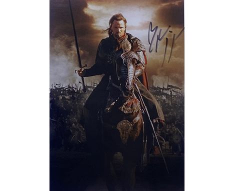 Viggo Mortensen - Lord Of The Rings - autographed 8x10" colour photograph from the franchise. Signed in black ink to a light 