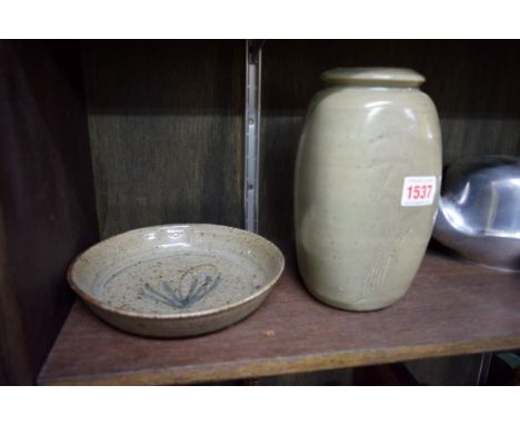 Studio Pottery: a Bernard Leach vase, with incised decoration, 20cm high; together with a Jeremy Leach dish, 19cm diameter.  