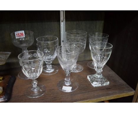 Seven antique drinking glasses, to include a pedestal glass with lemon squeezer foot.