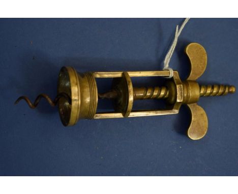 A 19th century brass Farrow & Jackson corkscrew. 