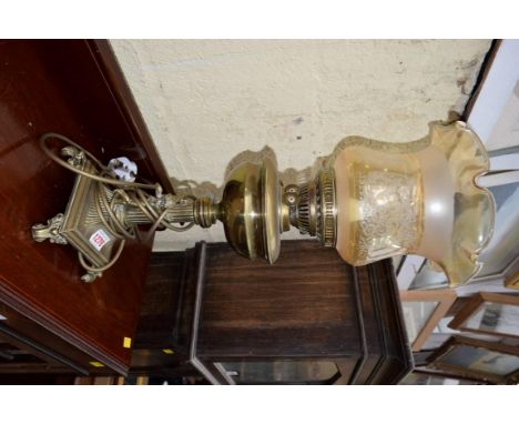 An old brass oil lamp.