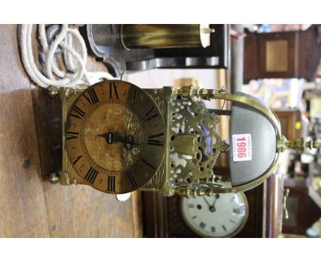 An old lantern clock, with 6in dial and anchor escapement, with pendulum, later bracket and weight, (comprising early element