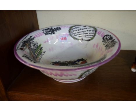 A 19th century Sunderland lustre 'Crimea' basin, 32cm diameter, (cracked).   Condition Report:  Cracks run from rim edge for 