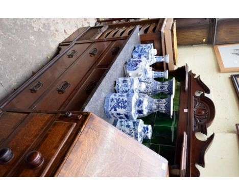 A circa 1900 carved mahogany wash stand with green tile back, 106.5cm wide.