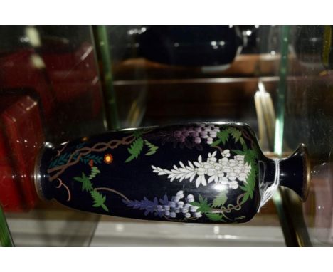 A Japanese cloisonne enamel vase, decorated with wisteria, 18.5cm high.    Condition Report:  Some minor surface scratching. 