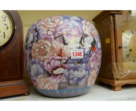 An Oriental cloisonne enamel ovoid jar and cover, decorated with cranes and flowers, 22cm high. 