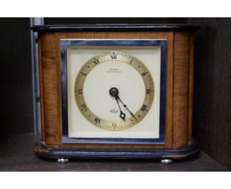 An Elliott walnut mantel clock, 18cm wide. 