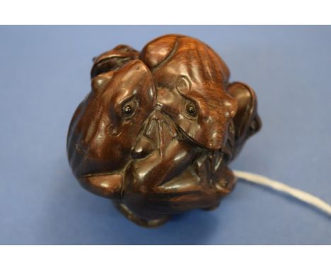 A Japanese carved wood large netsuke, in the form of a cluster of six frogs, 6cm diameter. 