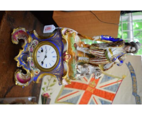 A late 19th century Continental porcelain mantel clock, the dial inscribed 'Castil a Paris', 40cm high. 