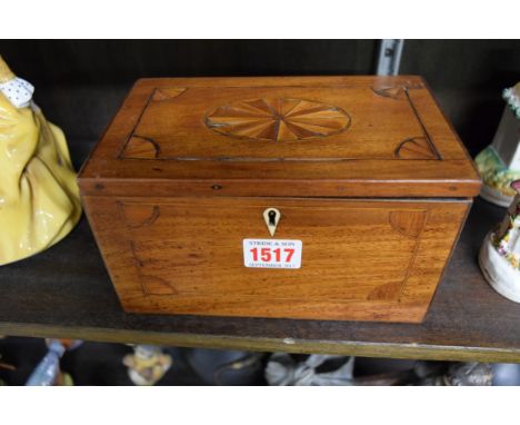 A George III mahogany and inlaid tea caddy, 19.5cm wide. 