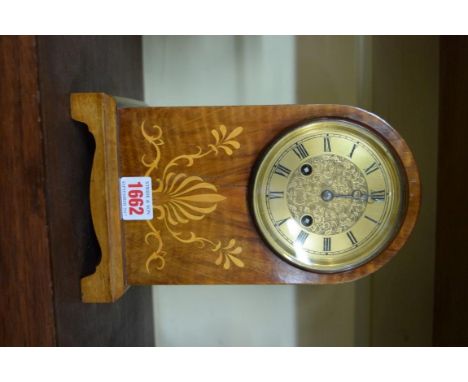 A circa 1900 walnut and inlaid dome top mantel clock, 24.5cm high. 
