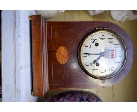 An Edwardian mahogany and inlaid dome top mantel clock, 30cm high. 