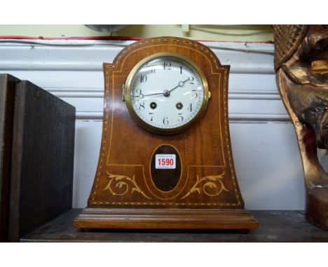 A circa 1900 mahogany and inlaid mantel clock, 31cm high. 