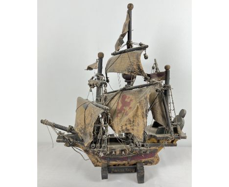 A handmade vintage wooden model of the Hanseatic ship (cog) Hansa Kogge with painted sails. Approx. 50cm tall. 