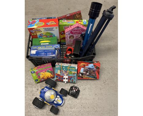 A box of assorted toys, games, puzzles and remote control cars. To include: Mega Bloks game, 3D marble puzzle game, telescope