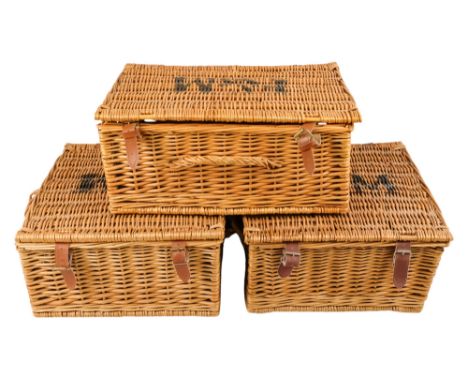 A Fortnum &amp; Mason wicker hamper - rectangular with brown leather straps, 46 x 30 x 20cm, together with two similar.