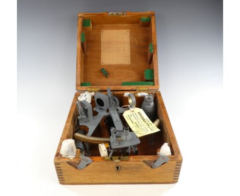 A late 20th century Royal Navy sextant by Hughes &amp; Son London - grey painted and complete with accessories and mahogany c