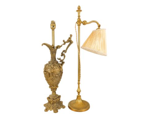 A bronze Baroque style table lamp - modelled in the form of a jug, with strapwork decoration and masks, 52cm high, together w